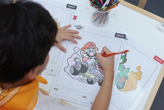 A kid coloring a picture

AI-generated content may be incorrect.