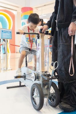 A child on a small bicycle

AI-generated content may be incorrect.
