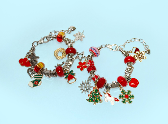 A pair of bracelets with charms

AI-generated content may be incorrect.