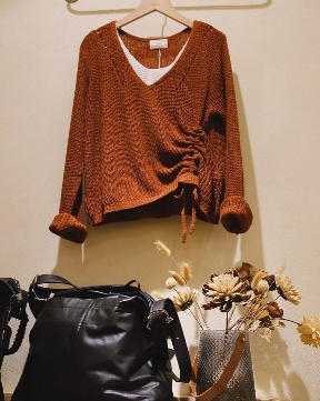 A sweater on a swinger
AI-generated content may be incorrect.