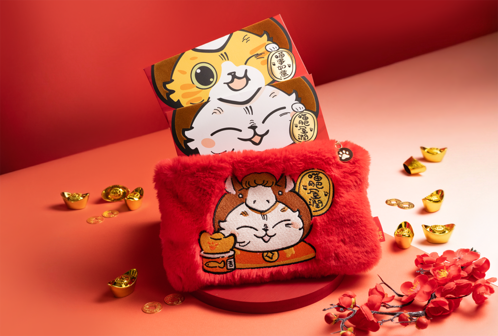 A red pouch with cartoon cats on it

AI-generated content may be incorrect.