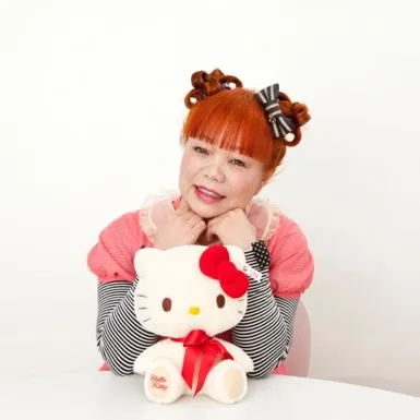 A person holding a stuffed animal

Description automatically generated