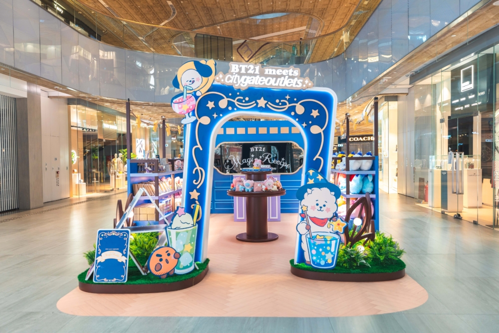A blue archway with cartoon characters
Description automatically generated