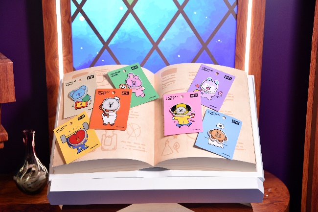 A book with cartoon characters on it

Description automatically generated