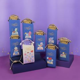 A group of blue boxes with designs on them

Description automatically generated