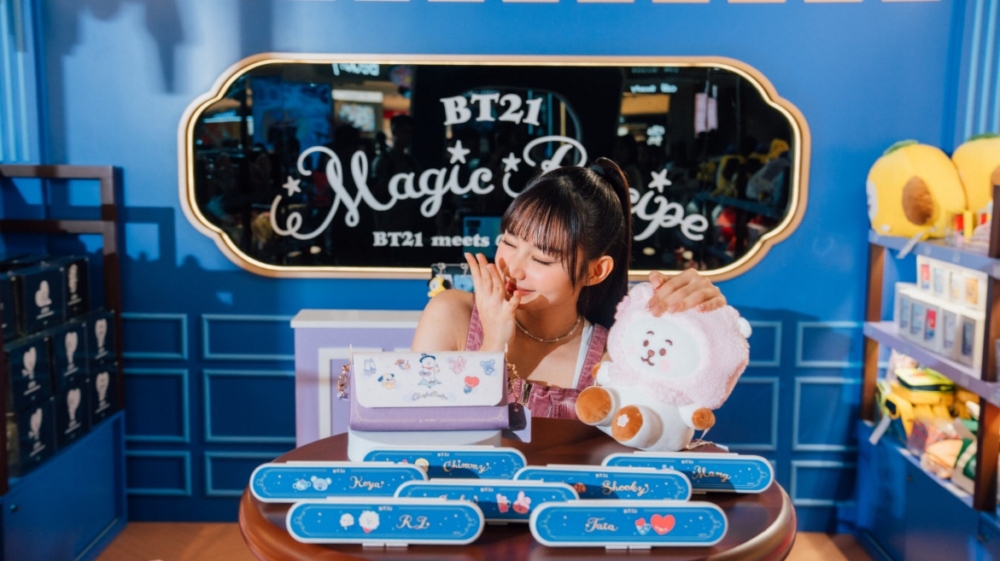 A person holding a stuffed animal

Description automatically generated