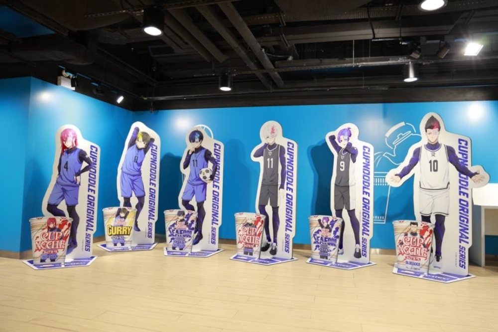 A group of cartoon characters standing in a room Description automatically generated