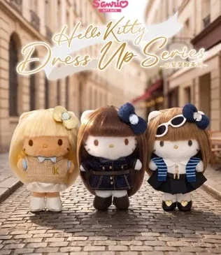 A group of stuffed dolls on a brick street Description automatically generated