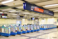A row of machines in a subway station AI-generated content may be incorrect.
